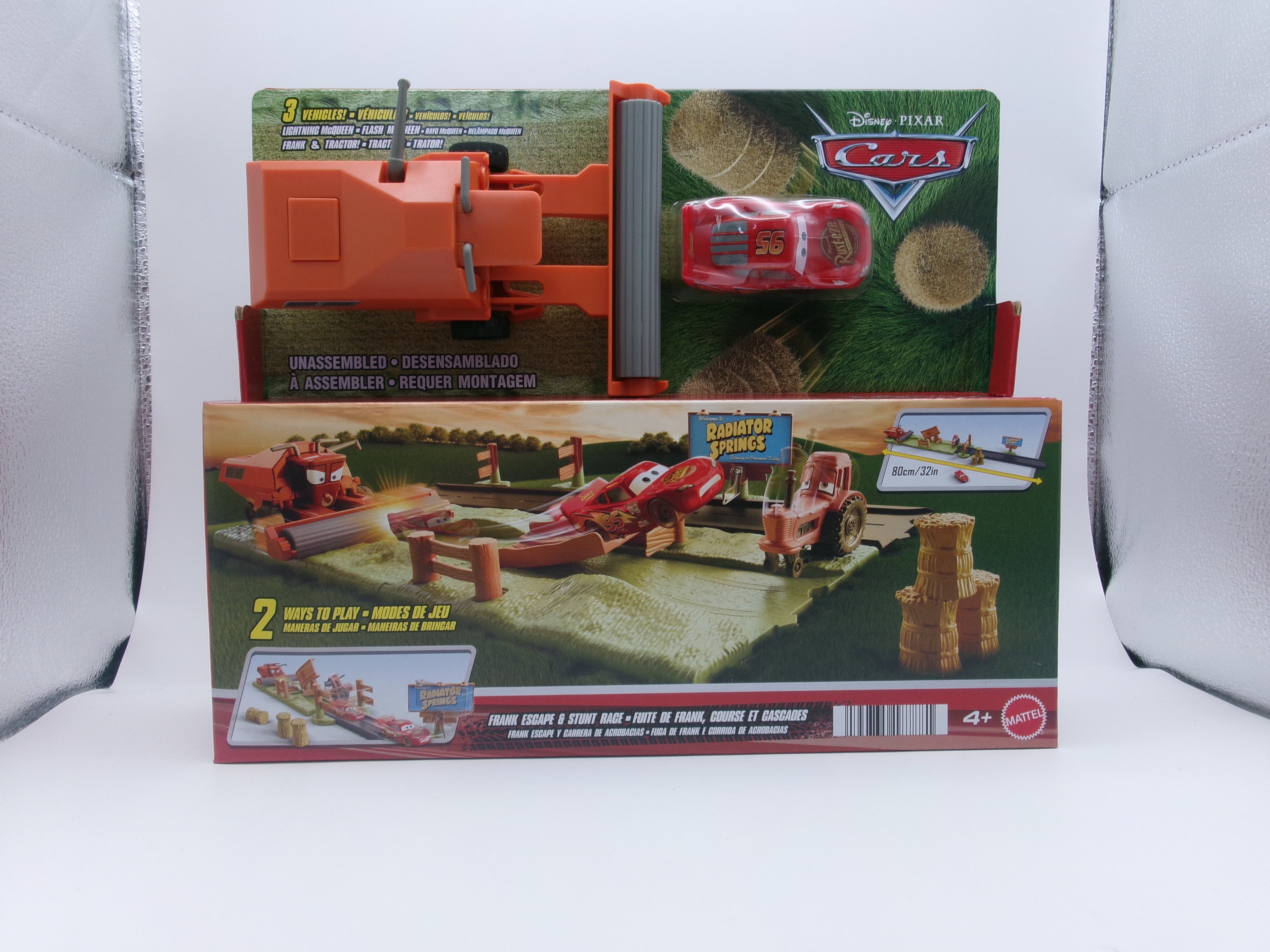 DISNEY PIXAR CARS FRANK ESCAPE & STUNT RACE