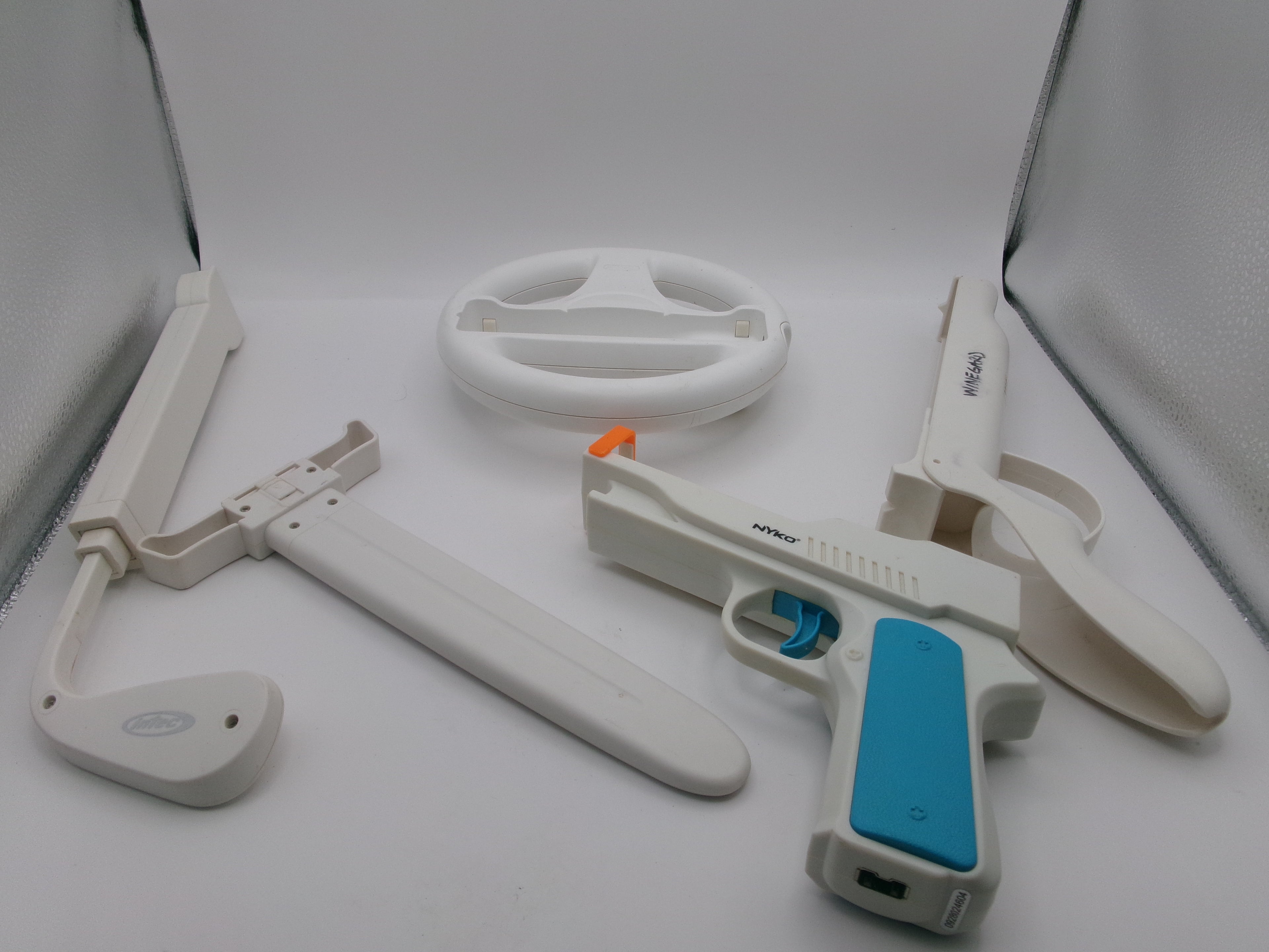 Nintendo Wii Sports Pack Accesories Zapper Gun, Hand Gun, Baseball Bats, Tennis Rackets, Golf Clubs, and Steering Wheel