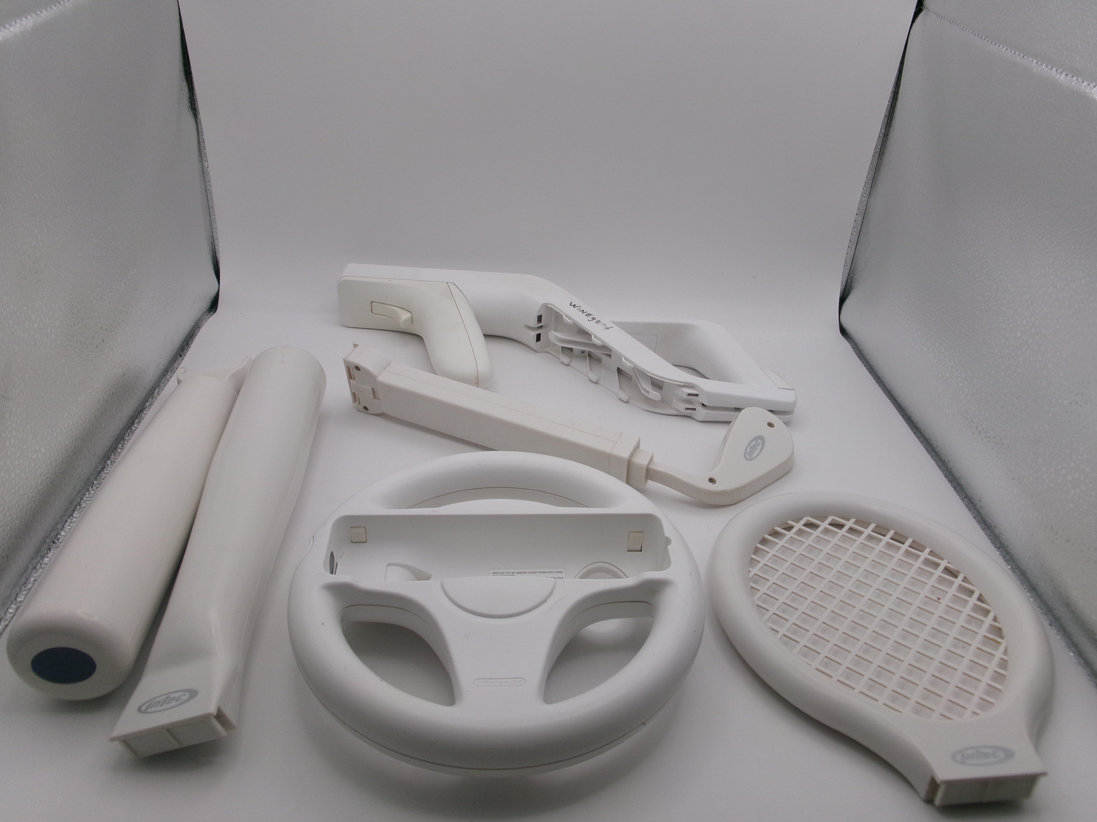 Nintendo Wii Sports Pack Accesories Zapper Gun, Hand Gun, Baseball Bats, Tennis Rackets, Golf Clubs, and Steering Wheel
