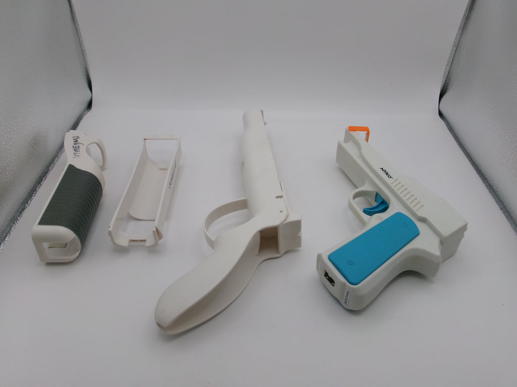 Nintendo Wii Sports Pack Accesories Zapper Gun, Hand Gun, Baseball Bats, Tennis Rackets, Golf Clubs, and Steering Wheel