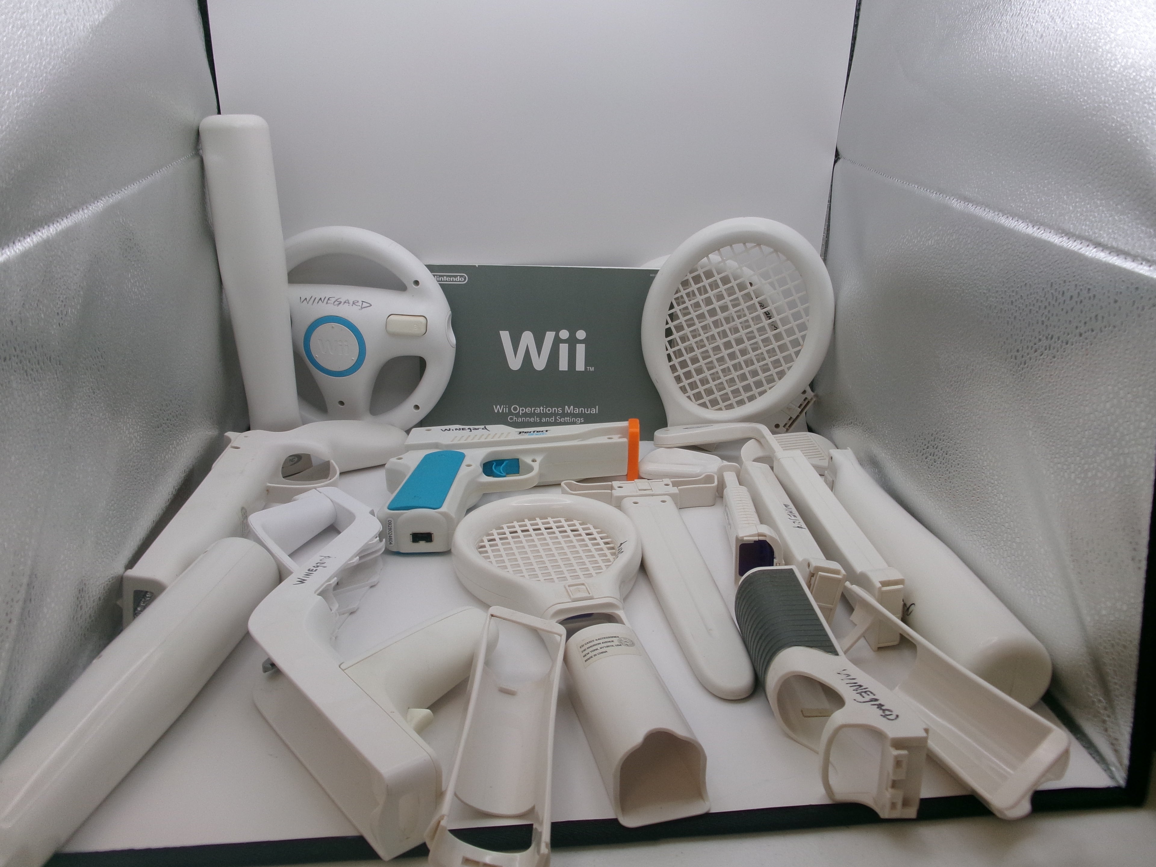 Nintendo Wii Sports Pack Accesories Zapper Gun, Hand Gun, Baseball Bats, Tennis Rackets, Golf Clubs, and Steering Wheel
