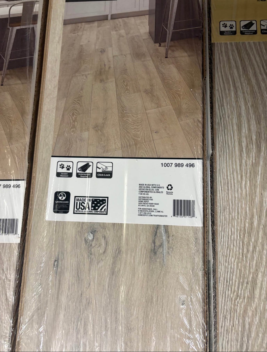 TrafficMaster Camden Lake Oak 7 mm T x 8 in. W Laminate Wood Flooring (23.9 sqft/case)