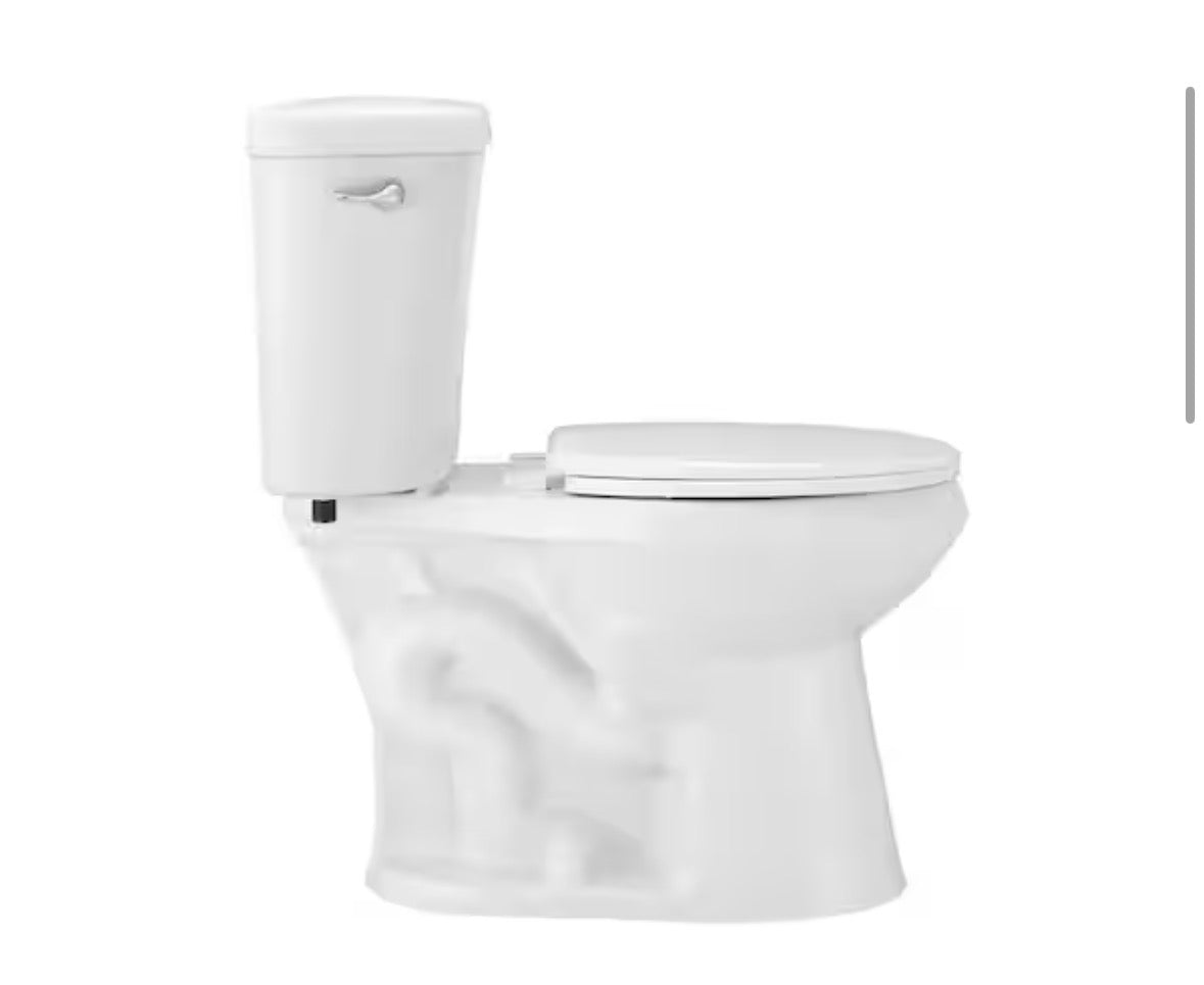 Glacier Bay 10 in. Rough In 2-Piece 1.28 GPF Single Flush Round Toilet in White, Seat Included